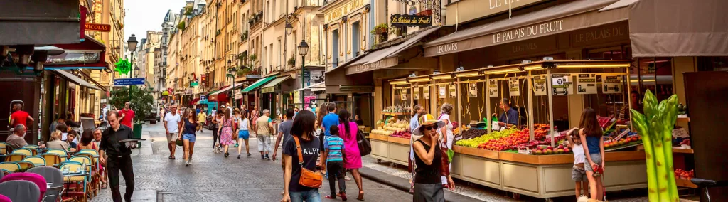 Cafés and fresh produce on the beautiful street "Rue Montorgueil" in Paris