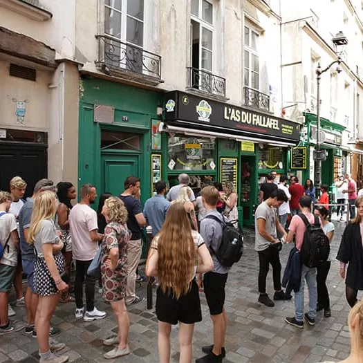 A long line at the middle-eastern restaurant "L'as de Falafel" in Paris