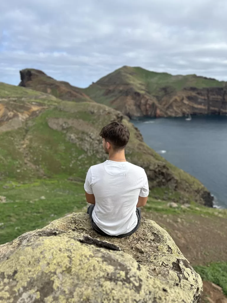 me sitting overlooking the scenery on the northeast coast of madeira