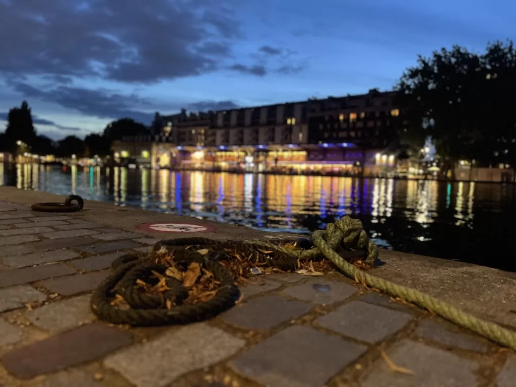 The vibrant and summery atmosphere at the banks of the Bassin de la Villette in the 19th arrondissement of Paris