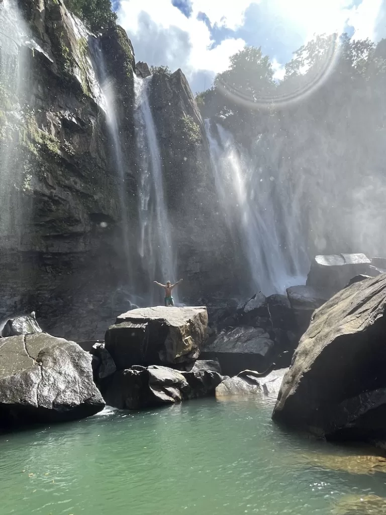 Me cliff jumping at the upper section of the Nauyaca Waterfalls