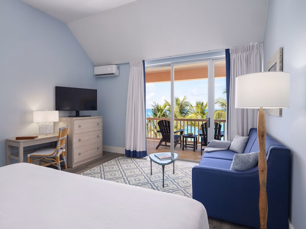 ocean-view guest room with a balcony at the reefs resort and club in southampton, bermuda